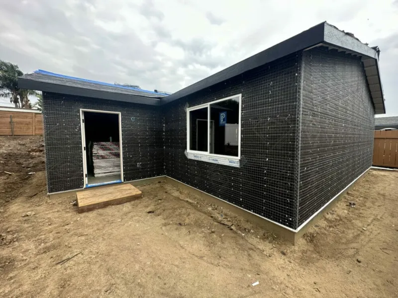 Home addition with wire lath ready for stucco, built by Loona Construction
